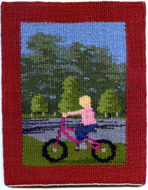 child on bike